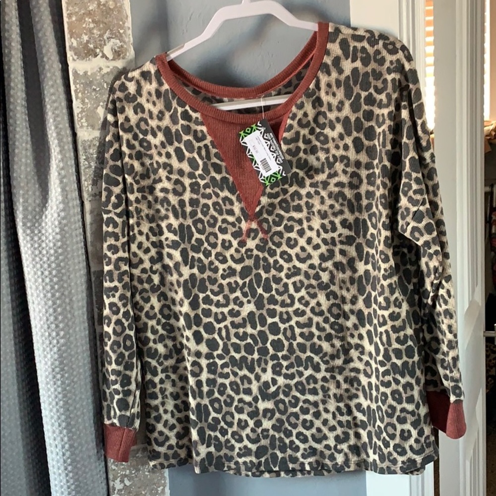 Women’s Cheetah and rust color long sleeve!